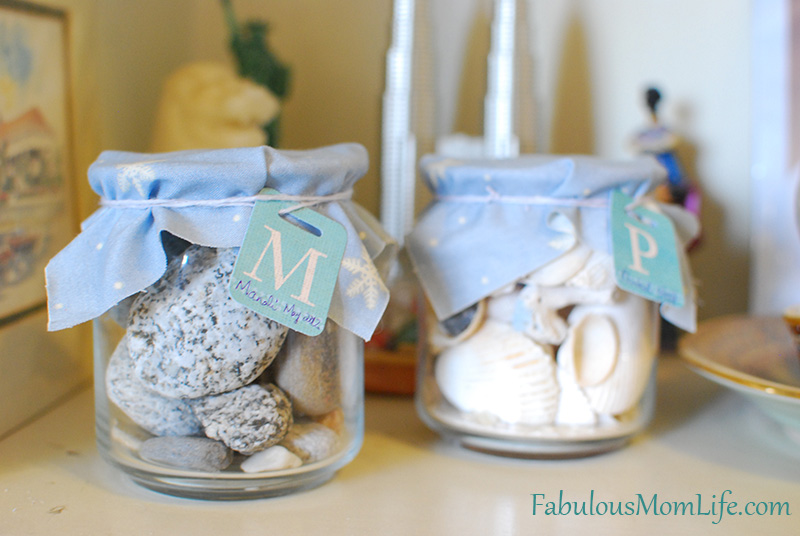 Displaying collected pebbles and seashells in jars