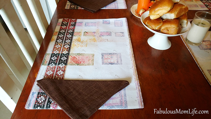 beige and brown placemats and napkins