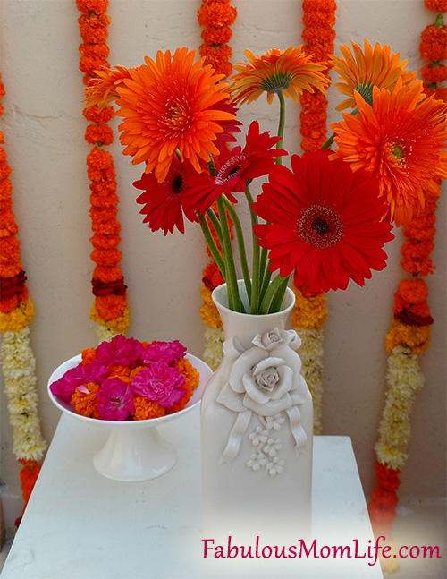 diwali decor red orange gerbera flower arrangement
