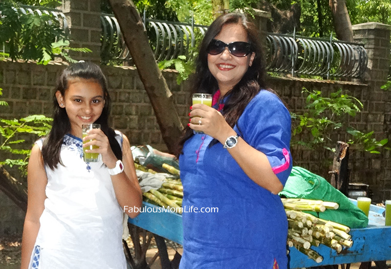 Enjoying the Indian Summer Delight - Sugarcane Juice - during Summer Vacations