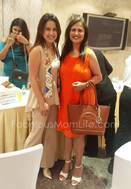 Orange Dress, white heels and tan handbag outfit - with Amrita Raichand