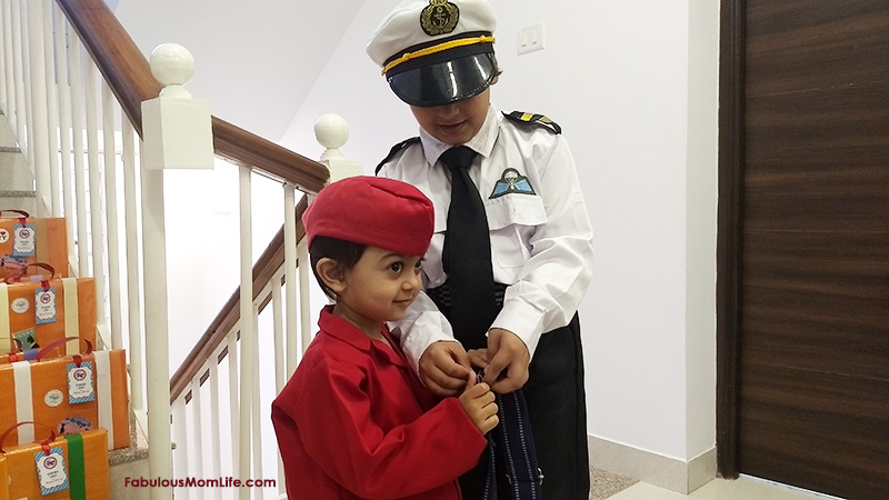 Around the World Party - Air Hostess demonstrating seat belts