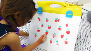 thumb print strawberry art for toddlers