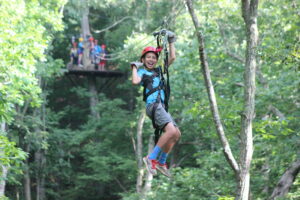 Kids ziplining at Virginia Canopy Tours in Shenandoah River State Park