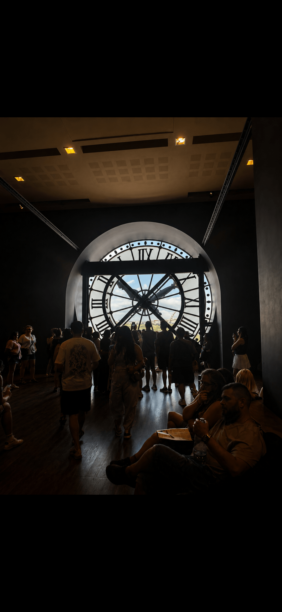 Behind the Musee d’Orsay clock on the 5th floor